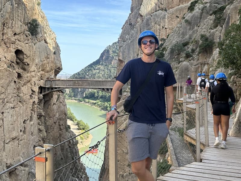 Mex on the Caminito del Rey with a view over the gorge and the valley